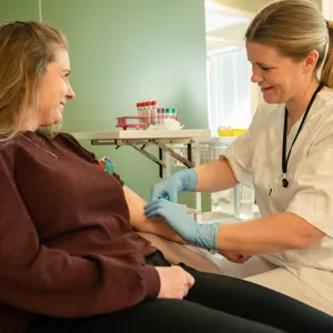 A doctor attending to a patient